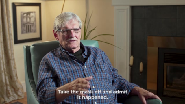 Maury Blair seated at home, sharing his story